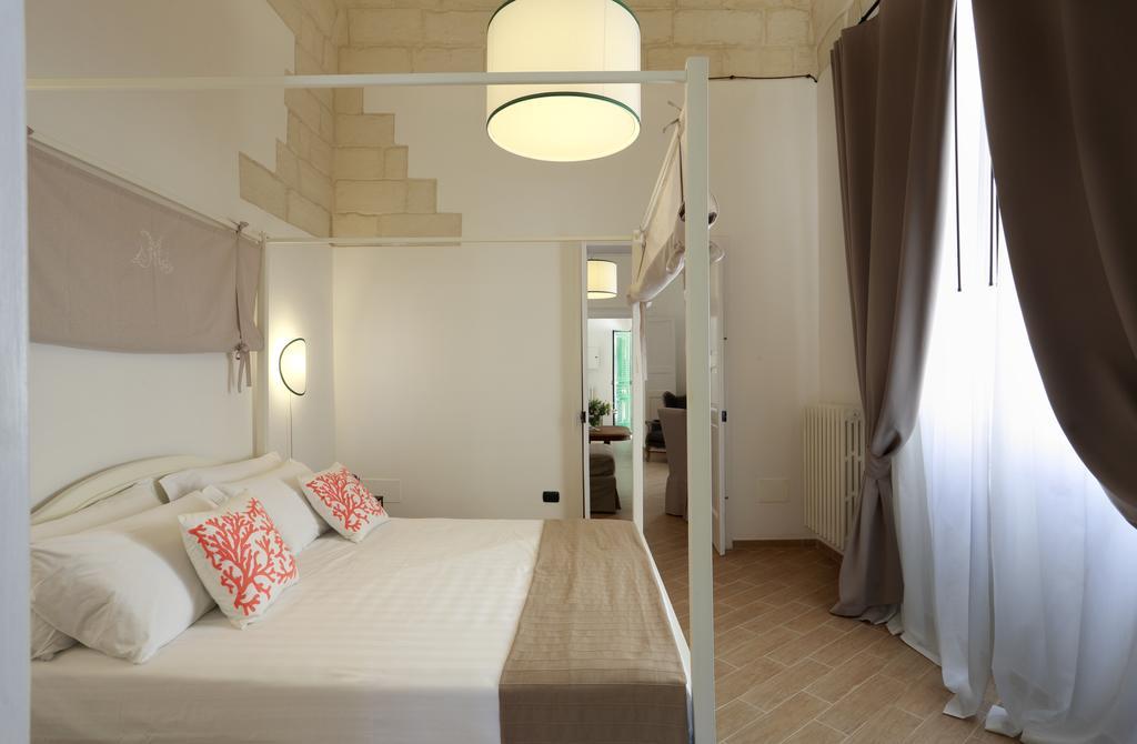 Santa Marta Suites & Apartments Лечче Номер фото