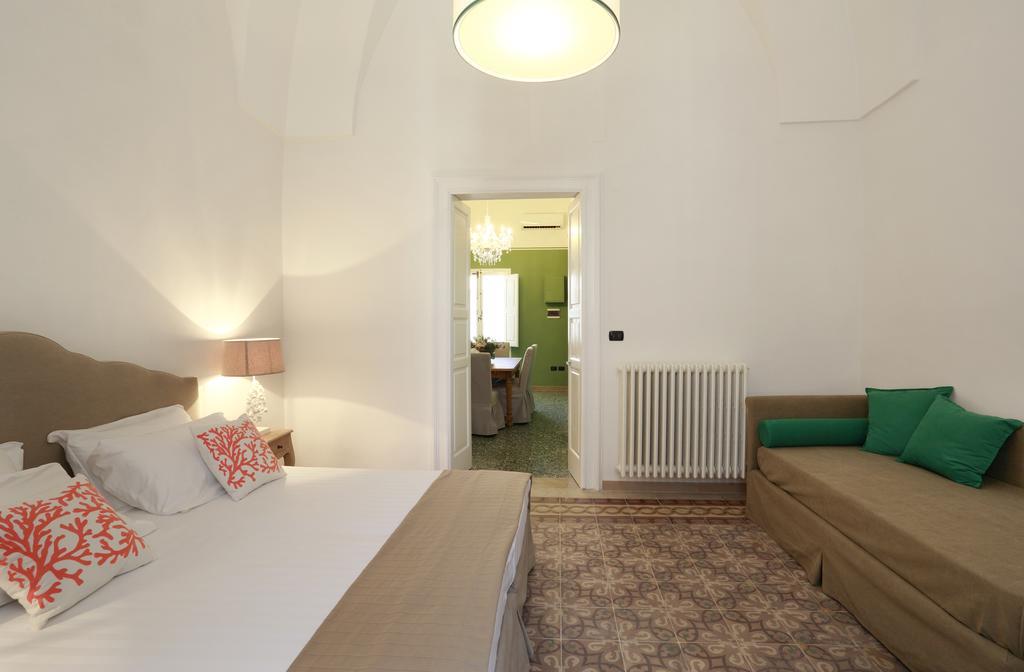Santa Marta Suites & Apartments Лечче Номер фото